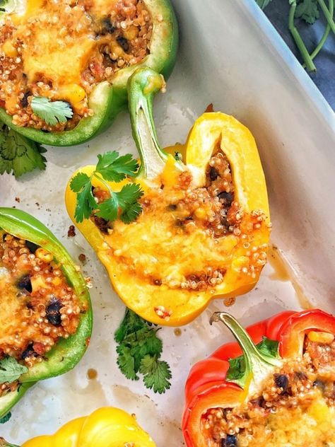 Quinoa stuffed bell peppers are vegetarian, and are full of vegetables, beans, and Mexican-style flavors that are sure to spice up your dinner routine! These easy stuffed bell peppers are simple to throw together, all in one bowl, and end up super cheesy and not soggy or watery at all! Make sure to top them with extra cheese towards the end for extra flavor! These Mexican stuffed peppers are full of spices, seasonings, and are just loaded with flavors! They also make a great freezer meal! Bell Pepper Recipes Stuffed Vegetarian, Healthy Stuffed Bell Peppers Vegetarian, Mexican Quinoa Stuffed Peppers, Easy Stuffed Bell Peppers, Quinoa Stuffed Bell Peppers Vegetarian, Quinoa Stuffed Bell Peppers Vegan, Quinoa Stuffed Bell Peppers, Mexican Stuffed Peppers, Freezer Meal