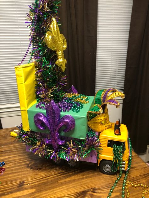 Finally, a use for one of our many broken trucks and all the Mardi Gras gear we caught at the parades last weekend! Mardi Gras Shoebox Float Ideas, Shoe Box Mardi Gras Float For Kids, Diy Mardi Gras Float For Kids, Mardi Gras Float Shoe Box Project, Mardi Gras Wagon Float Ideas For Kids, Mardi Gras Floats, Kids Mardi Gras Float Wagons, Alligator Mardi Gras Float, Mardi Gras Float