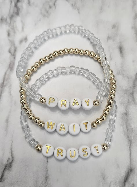 Set of 3 stretch "pray" "wait" "trust" clear and gold bracelets Check size chart Christian Beaded Bracelets, Christian Reminders, Jesus Bracelet, Pray Wait Trust, Prayer Jewelry, Homemade Bracelets, Bff Jewelry, Christian Bracelets, Bracelet Inspo