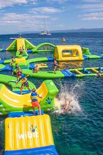 Water Parks In Texas, Water Places, Seaside Heights, Inflatable Water Park, Water Playground, Lake Travis, Water Sport, Floating In Water, Lake Michigan