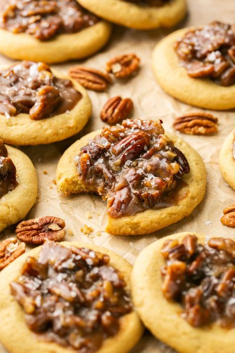 These Pecan Pie Cookies have a soft and chewy sugar cookie dough base with a gooey, sweet, crunchy pecan pie filling. It's Pecan Pie in a hand-held treat! Perfect for the holiday season of cookie exchanges! #pecanpie #pecanpiecookies #krollskorner #holidaycookies #cookiebox #pecanpierecipes #christmascookies #thanksgivingdesserts Betty Crocker Pecan Pie Cookies, Craisin Cookie Recipes, Cranberry Cheesecake Cookies, Candied Pecan Cookies, Kroll Korner Cookies, Easy Pecan Pie Cookies, Pecan Pie Stuffed Cookies, Chocolate Pecan Pie Cookies, Ideas For Christmas Cookies