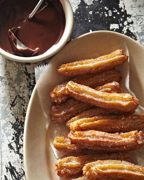 anise churros with chocolate sauce | better homes & gardens Hispanic Christmas, Mexican Desserts, Homemade Churros, Mexican Menu, Chunky Guacamole, Oaxaca Cheese, Tamale Recipe, Christmas Dinner Menu, Anise Seed