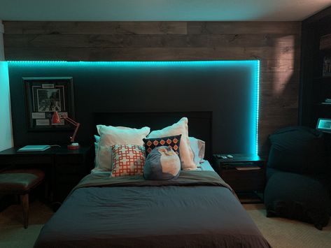 Modern boys bedroom accent wall made with straight edge shiplap and stained with weathered grey. Lighting is munger LED strip lights Boys Bedroom Modern, Modern Boys Rooms, Modern Boys Bedroom, Teenager Bedroom Boy, Neon Bedroom, Boys Bedroom Makeover, Led Lighting Bedroom, Boy Bedroom Design, Bedroom Setup