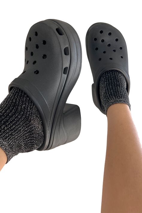 We know the "ugly" shoe trend has come back around, but we're partial to one in particular: the Croc. Here's why we think Crocs are about to make a comeback. Platform Crocs, Clog Shoe, Shoe Trend, Flowy Summer Dresses, Ugly Shoes, Statement Shoe, Black Loafers, Celebrity Street Style, Comfortable Heels