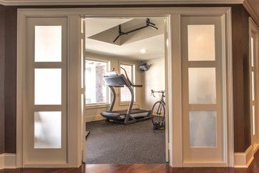 home gym doors that let in light Basement Gym Door Ideas, Home Gym Modern, Basement Gym And Family Room, Basement Luxury, Gym Doors, Gym Door, Gym Modern, Basement Home Gym, Basement Gym Ideas