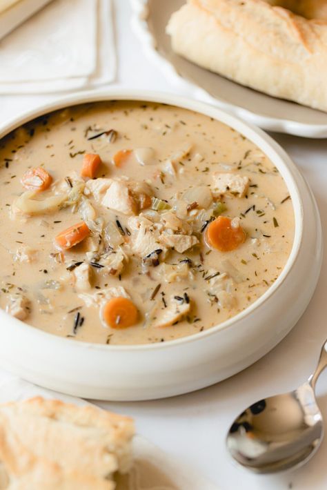 Creamy Panera Chicken and Wild Rice Soup (Copycat Recipe!) Chicken Wild Rice Soup Panera Copycat, Hardy Winter Meals, Panera Bread Chicken And Wild Rice Soup, Copycat Restaurant Recipes Soup, Panera Chicken And Wild Rice Soup, Creamy Wild Rice Chicken Soup, Hardy Soups, Camp Soup, Chicken Avocado Melt