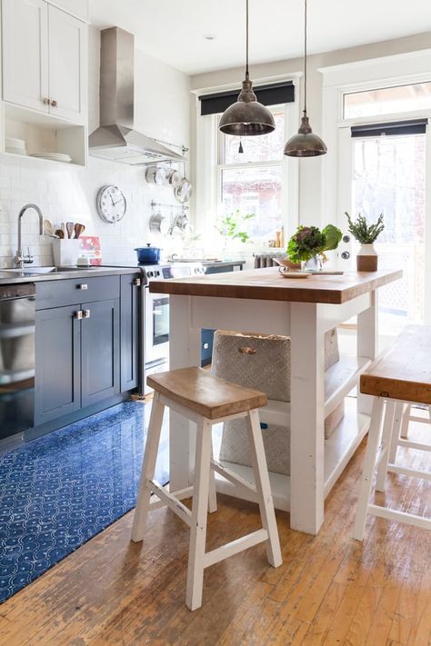 "The island gives additional counter space and is a casual spot for the family to share a meal." While the high bench provides ample seating, "having the family room right off the kitchen now allows everyone to hang out close to one another during meal preparation—without having too many cooks in the kitchen."  See more Kitchen Island Breakfast Bar Ideas & Inspiration | Apartment Therapy Kitchen Island Bench Seating, Breakfast Bar Small Kitchen, Breakfast Bar Kitchen Island, Kitchen Island Bench, Small Apartment Kitchen, Small Kitchen Island, Kitchen Island Bar, Breakfast Bar Kitchen, Kitchen Island Design