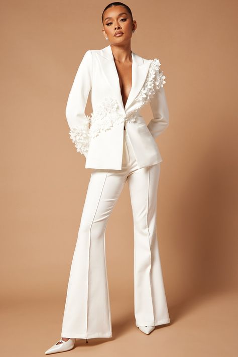 Available In Light Blue And White. Blazer Set 3D Floral Applique Lapel Collar Long Sleeve w/ Shoulder Pads Button Closure Front Pocket Lined Flare Pant Front Closure Slight Stretch Shell: 95% Polyester 5% Spandex Lining: 92% Polyester 8% Spandex Imported | Claudette Floral Embroidered Suit Set in White size XS by Fashion Nova White Suit Gold Accents, Bridal White Suit, Women Suit Graduation, White Pant Suit Women Wedding, Women’s White Suit, Bridal Suits For Women, White Lace Suit, White Pant Suit Women, White Suits For Women