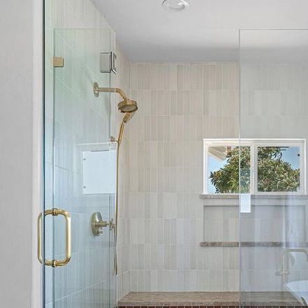 Bedrosians Tile and Stone on Instagram: "Double walk-in shower goals! 🚿 Shower Tile: Makoto 2.5x10 in Umi Terracotta and Shoji White Shower Floors: Makoto 2" Circles in Umi Terracotta Designed by @vineyardvistavibes" Makoto Shoji White Tile, Terra Cotta Shower Tile, Makoto Tile, Terracotta Tile Bathroom Showers, Bedrosians Makoto Shoji White, Bathroom Remodel Terra Cotta, Bedrosians Makoto Tile, Shoji White, White Shower