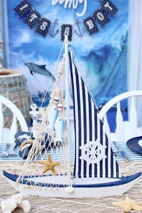 Check out this wonderful nautical baby shower! The party decorations are fantastic! See more party ideas and share yours at CatchMyParty.com Nautical Theme Centerpieces, Sailboat Baby Shower Theme, Chic Party Decor, Nautical Baby Shower Cake, Nautical Baby Shower Decorations, Blue Baby Shower Decorations, Baby Shower Party Planning, Baby Boy Shower Party, Baby Shower Party Ideas