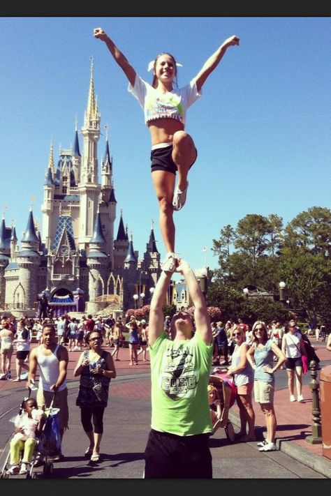 Cheering at Disney (: look at everyone's faces watching them hhahahahaha One Man Stunt, 2 Person Stunts, Cheer Jumps, Cheer Things, Billy Kid, Cheer Pics, Cheerleading Photos, Cheer Poses, Gymnastics Skills