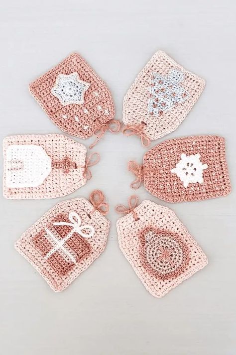 🌟 Deck the halls with handmade charm using these crochet Christmas tree bunting patterns! 🎁🎅 Add a sprinkle of festive magic to your home with adorable, crocheted trees. Perfect for beginners and seasoned crocheters, these patterns bring joy and warmth to your holiday decor. Get ready to crochet your way to a merry and bright Christmas! 🌟🎄 #CrochetPatterns #ChristmasDecor #TreeBunting #HandmadeHoliday #FestiveCrafts #CreativeStitching #HolidayCrochet #DIYDecor" Free Crochet Pattern Christmas, Crochet Xmas Gifts, Crochet Christmas Garland, Christmas Gift Tags Free, Bunting Pattern, Crochet Christmas Ornaments Free, Crochet Pattern Christmas, Crochet Tree, Crochet Christmas Gifts