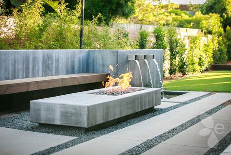 Outdoor living area in Solana Beach by Eco Minded Solutions, showcasing captivating fire and water features, blending nature and luxury seamlessly. Fireplace With Water Feature, Water Feature Wall, Outdoor Fireplaces, Fire And Water, Solana Beach, Fire Pit Area, Water Walls, Fire Bowls, Perfect Harmony