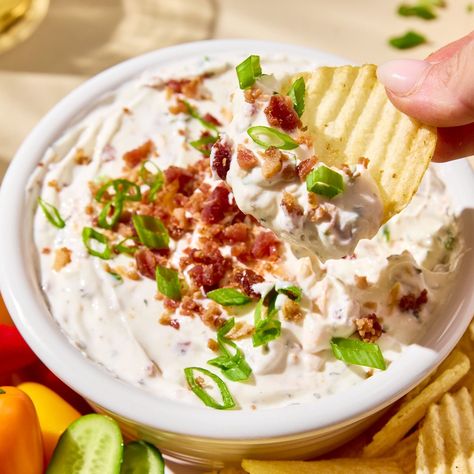 This High Protein Crack Dip recipe is perfect for the pool, parties, and snacking. It features a blend of Greek yogurt, ranch seasoning, cheddar cheese, crispy bacon, and green onions. A healthier twist on a classic favorite, it pairs perfectly with chips, crackers, or fresh veggies. This recipe is low carb and gluten-free and can also be tailored or be dairy-free. Easy Protein Pancakes, Yogurt Ranch, Greek Yogurt Ranch, Dairy Free Yogurt, Dairy Free Cheese, Dairy Free Options, Ranch Seasoning, High Protein Low Carb, Pool Parties