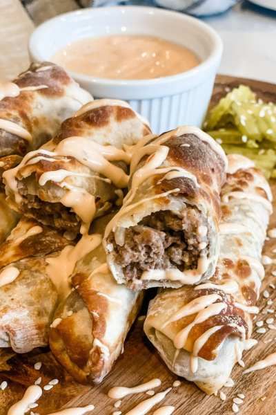 Weight Watchers Super Bowl Recipes, Big Mac Egg Rolls, Pound Dropper, Bacon Wrapped Chicken Tenders, Super Bowl Recipes, New Year's Eve Appetizers, Chili Mac And Cheese, Superbowl Appetizers, Easy Taco