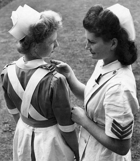 Nurses at Dulwich Hospital had a preview today of uniforms they will wear in the future as soon as their present ones wear out. The uniforms are completely new and may be adopted by every hospital in Britain. May 1949 P018812 #MediaStorehouse Hospital Pins, Old Hospital, Nursing Pins, Hospitality Uniform, Vintage Nurse, Wwii Photos, Vintage Medical, Nursing Cap, Memorial Hospital