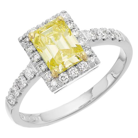 Diamond ring consisting of a stunning rectangular cut fancy intense yellow diamond captured in a yellow gold 4 claws within a frame of round brilliant white diamonds set on a white gold band with diamond shoulder. British hallmarked London platinum 950, sponsor mark "PW" 1 x rectangular cut diamond, Fancy intense colour, weight 1.05 carats, Clarity VVS2 26 x round brilliant cut diamonds, approximate total weight 0.40 carats, G/H colour, VS Clarity UK ring size "M&1/2", and it can be resize upon Yellow Diamond Emerald Cut, Halo Engagement Ring Wedding Band, Pink Diamond Engagement Ring, Square Engagement Rings, Cluster Ring Set, Emerald Cut Ring, Stunning Diamond Rings, Contemporary Engagement Rings, Colored Diamond Rings