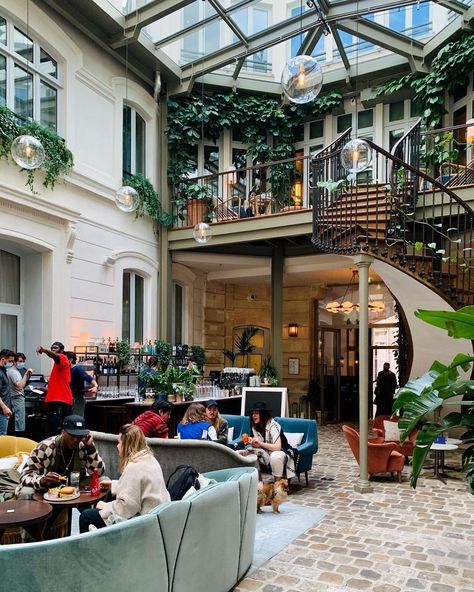 Y.G on Instagram: “📍The Hoxton Hotel, Paris Cosy place with stunning design for a coffee afternoon” Hotel Hoxton, Parisian Hotel, The Hoxton, Tivoli Gardens, Landmark Buildings, Patio Interior, Hotel Interiors, Glass Roof, Design Hotel