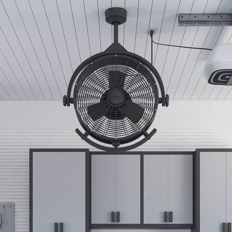 The Harbor Breeze 18" Cohort industrial style garage fan is perfect for any indoor or covered outdoor space from garages, workshops, and gyms to porches and warehouses. Harbor Breeze Cohort Garage Fan 18-in Matte black Blades Indoor/Outdoor Ceiling Fan (3-Blade) | 42955 Feminine Garage, Garage Gym Decor, Black Garage Gym, Garage Lights Interior Ceilings, Under Deck Ceiling Ideas, Porch Ceiling Ideas Cheap, Garage Walls Covering Ideas, Garage Hangout Ideas, Half Garage Gym Ideas Small