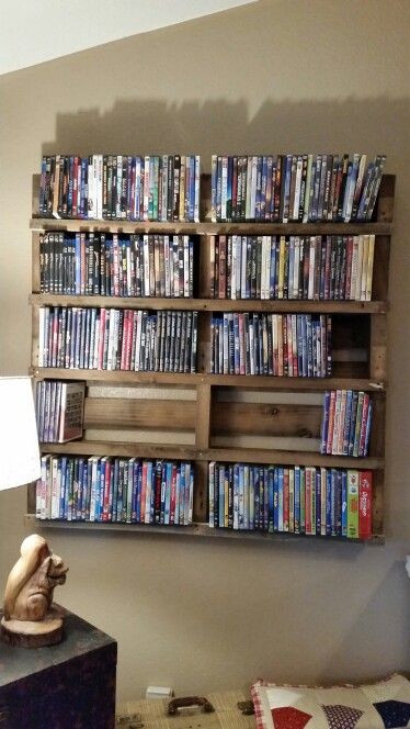 Pallet DVD storage - we made this in 20 minutes!                              … Dvd Display Ideas, Diy Dvd Storage, Wall Tv Stand, Dvd Shelves, Cd Storage, Dvd Storage, Diy Tv Stand, Diy Tv, Diy Pallet Projects