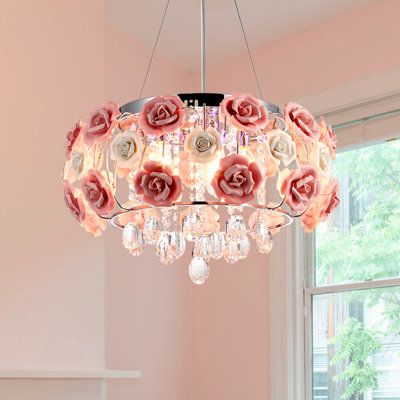 What catches your eye is a 20-inch pink rose crystal chandelier with a romantic design style. It is composed of a metal iron frame as the main body of the lamp and is decorated with ceramic roses on the outside and things of clear crystals hanging below. This unique and elegant chandelier design creates a warm and romantic ambiance in your space.(Installation video:https://www. youtube. com/watch?v=sT0EF0vbcnY) House of Hampton® | House of Hampton® Jenesse 5 | 12" H X 20" W X 20" D | Wayfair Pink Chandelier Bedroom, Girly Light Fixtures, Chandelier Over Vanity, Pink Chandeliers, Loveshackfancy Bedroom, Chandelier In Bedroom, Wayfair Finds, Space Installation, Rose Lamp