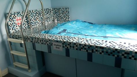 Cool swimming pool bed Idea for kids or teenager using mosaic tiles and pool steps. Also useful storage space underneath. snurk beddengoed duvet set and LED lighting Mansion Interior Bedroom, Swimming Rules, Bedroom For Kids, Swimming Jokes, Pool Bedroom, Pool Bed, Swimming Memes, Swimming Pictures, Pool Floats For Adults