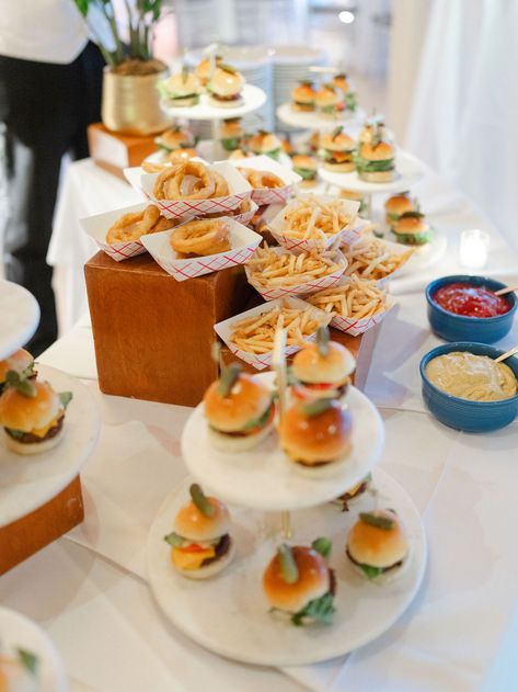 A mouthwatering spread of wedding appetizers, from sliders to gourmet onion rings. Perfect inspiration for planning an unforgettable wedding menu. Appetizer Display, City Interior, Wedding Appetizers, Social Gathering, Onion Rings, Wedding Menu, Social Events, Private Event, Event Space