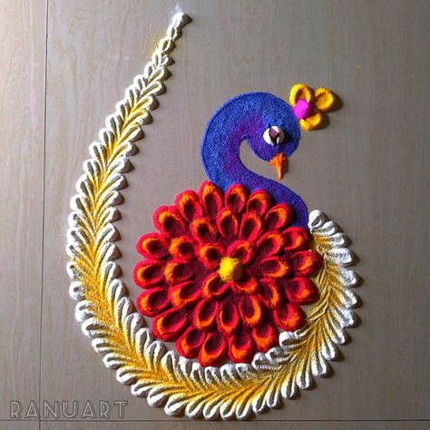 Visit YouTube channel RanuArt for video Peacock Small Rangoli, Bricks Decoration Ideas For Ganpati, Small Rangoli Ideas For Diwali, Rangoli Designs Ideas Diwali, How To Make Rangoli Design, Rangoli Designs Simple Small, Small Peacock Rangoli, Rangoli Designs Videos Diwali, Peacock Rangoli Easy