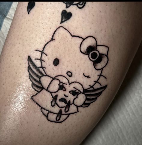 Hello Kitty Tattoo For Men, Dark Hello Kitty Tattoo, Emo Hello Kitty Tattoo, Kitty Tattoo, Angel Hello Kitty Tattoo, Tattoo Designs Hello Kitty, Hello Kitty Fine Line Tattoo, Hello Kitty Tattoo, Tatuajes Hello Kitty Tattoos