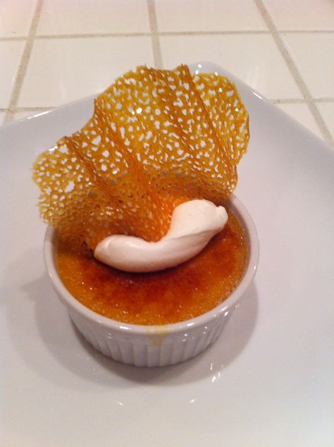 There can't be anything possibly wrong with this..mmmmmmmmm Pumpkin Creme Brulee w/ Pumpkin Tuile Plated Creme Brulee Desserts, Creme Brulee Presentation Ideas, Creme Brulee Fine Dining, Creme Brulee Presentation, Creme Brulee Plating Ideas, Cream Brulee Plating, Creme Brulee Plating, Ramekin Desserts, Ramekin Dessert