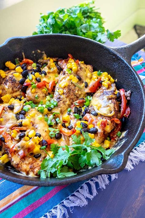 Keep it simple tonight with this easy one-skillet chicken dish. The Santa Fe Skillet Chicken dinner has excellent blended flavours combined with beans, corn, tomatoes and topped with melted cheese. Serve with a salad, rice, or gluten-free corn chips with your favourite toppings. This gluten-free chicken dinner is ideal for a lazy night in the … Santa Fe Skillet, Skillet Chicken Dinner, Dinner Ideas With Chicken, Gluten Free Dinner Ideas, Santa Fe Chicken, Dairy Free Recipes Dinner, Chicken Skillet Recipes, Dairy Free Dinner, Rice Dinner