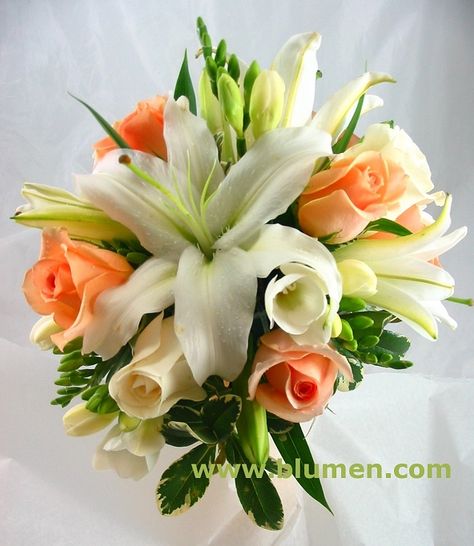 BW-73 Bouquet of white oriental lilies, peach and ivory roses and white freesia White And Yellow Wedding, Freesia Bouquet, Teal Bridesmaid, Teal Bridesmaid Dresses, Yellow Wedding Flowers, Yellow Bouquets, Wedding Bridesmaids Dresses Blue, Coral Roses, Peacock Colors