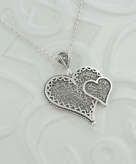 Find the perfect way to say "I ❤️ you" with our intricate 925 Sterling Silver Filigree Heart Pendant! 💞 Handcrafted with love, this elegant necklace features two hearts intertwined in a dance of devotion. Whether you're celebrating love, friendship, or self-love, this charm speaks volumes without saying a word. Ready to wear your heart on your neck? Click to ad👉 [https://nuel.ink/Ihmzci and let your love shine! ✨ #HeartToHeart #SterlingSilver #EtsyFinds Filigree Silver Jewelry, Accessorize Jewellery, Filigree Jewelry, Art Heart, Heart Women, Filigree Pendant, Sterling Silver Filigree, Double Heart, Silver Filigree