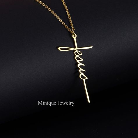 Express your faith with a Solid Sterling Silver or 18K Gold Plated Jesus Cross Necklace. The minimalist Jesus script necklace has a simple yet elegant look! Made in NC, USA, and shipped the next day! ✝️Material: Sterling Silver ✝️Finish: High Polished Rhodium or 18K Gold plated ✝️Nickel Free, Tarnish Resistant ✝️Dimensions: Large Size: Height: 44 mm (1.73 inches) Small Size: Height: 27 mm (Slightly more than an inch). Width: 14 mm ✝️The chain length is 18 inches Each item comes in a gift box, re Elegant Cross Necklace, God Jewellery, Christian Necklaces, Gold Cross Necklace For Women, Christian Items, Jesus Cross Necklace, Christian Cross Necklace, Jesus Gift, Christian Accessories