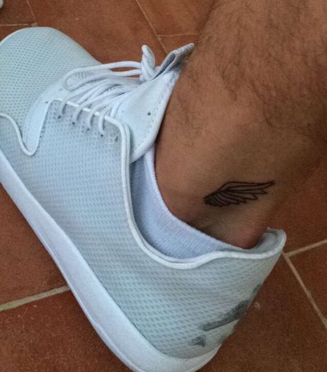 Small Angel wing tattoo on ankle Ankle Tats Men, Wing On Ankle Tattoo, Wing Tattoo On Ankle, Small Ankle Tattoo Men, Ankle Wing Tattoo, Men’s Ankle Tattoo, Angel Wing Ankle Tattoo, Belly Tattoos For Women, Small Angel Wing Tattoo