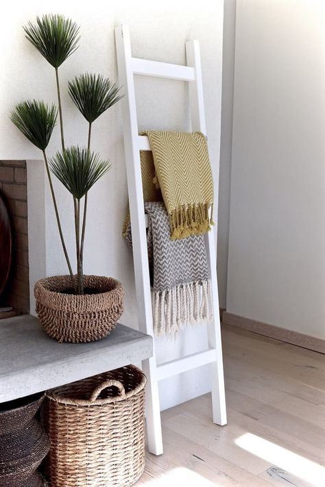 8 Unique Ways to Decorate with a Ladder Lovesac Sactionals, Bathroom Ladder, Wood Quilt, Quilt Ladder, Diy Blanket Ladder, Blanket Ladder, Diy Casa, Neutral Living Room, Towel Hanger