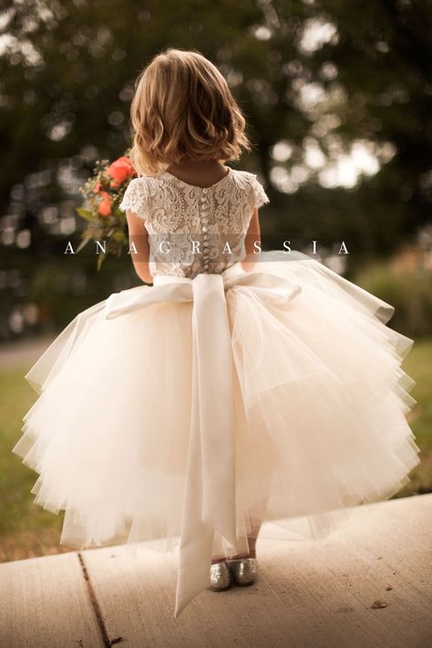 ANAGRASSIA flower girl dresses: ivory/champagne lace leotard & bodysuit with champagne/ivory/white tulle skirt and satin sash http://www.anagrassia.com Champagne Flower Girl, Girls Tulle Skirt, Lace Leotard, White Tulle Skirt, Girls Communion Dresses, Palm House, Princess Flower, Leotard Bodysuit, Tulle Flowers