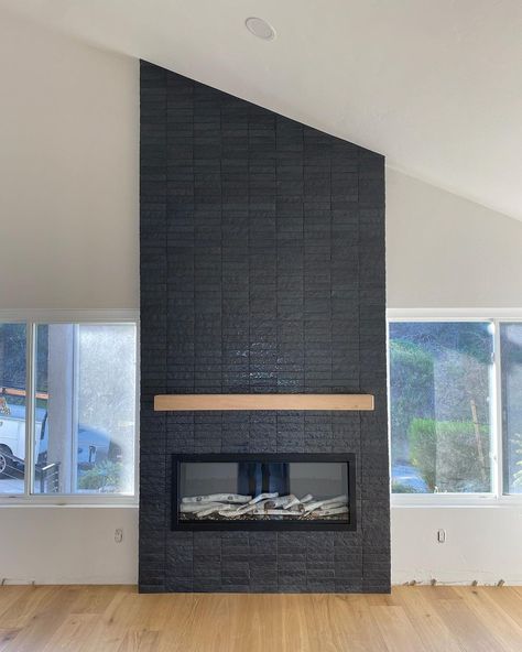 fireplace tile • Instagram Gray Cement Fireplace, Dekton Fireplace, Black Fireplace Tile, Fireplace Tile Ideas Modern, Modern Fireplace Tiles, Dark Fireplace, Black Tile Fireplace, Reface Fireplace, Stucco Fireplace