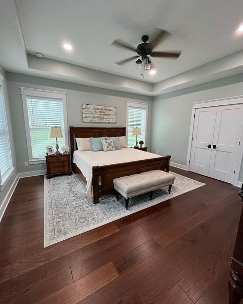 Sea Salt pairs nicely with white for a welcoming and relaxing vibe in this bedroom. Note how the paint color shows a hint of blue on the right wall. That is because of the abundance of light in that side. Benjamin Moore Sea Salt Bedroom, Sea Salt Paint Bedroom, Sea Salt Bedroom Decor, Seasalt Sw Bedroom, Master Bed And Bath Paint Colors, Sw Sea Salt Bedroom, Bedroom Wall Colors 2024, Sea Salt Sand Bedroom, Ranchero House