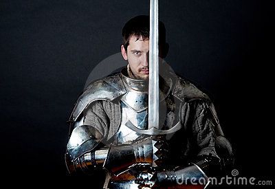 Warrior holding his great sword by Vladimirs Poplavskis, via Dreamstime Armor Inspiration, Imperiul Roman, Historical European Martial Arts, White Knight, Fantasy Figures, Medieval Life, Medieval Knight, Dark Ages, Art Poses