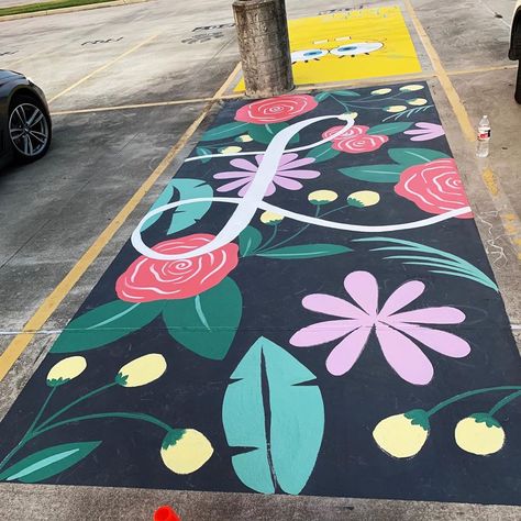 Calligraphy, Murals, Signage on Instagram: “Botanical parking lot painting with @Lucy.chavers 🌸⠀ ⠀ 2 days post hard workout so getting up and down to paint this was fun 😂 ⠀ Good thing…” Classroom Parking Lot Ideas, Parking Spot Painting Ideas, Senior Spots, Senior Year Scrapbook, Parking Lot Painting, Year Scrapbook, Senior Things, Parking Spot Painting, Spot Painting