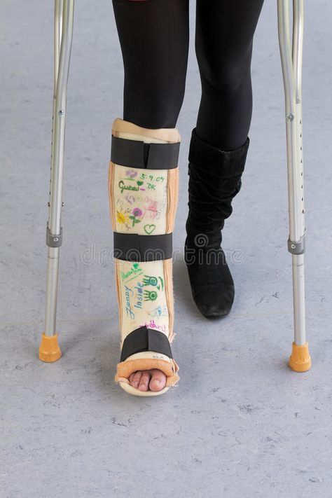 Leg cast and crutches. Broken leg in cast with autographs and crutches , #sponsored, #crutches, #cast, #Leg, #autographs, #leg #ad Leg Cast, Broken Leg, Crutches, Rubber Rain Boots, Stock Images Free, Photo Image, It Cast, Stock Photos, Boots