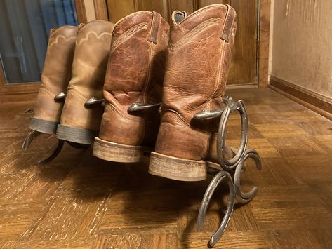 This handmade, durable, rustic, and unique design is made with used and cleaned horseshoes. The shoes are sourced from a local farrier in West Alabama! It holds 2 pair of boots

#bootrack #bootholder #boots #bootdecor #bootracks #cowboybootholder #cowboybootrack #upcycled #horseshoebootrack #horseshoebootholder #horseshoehomedecor #rustichomedecor #rusticfunctionaldecor #madeinusa #giftidea #gift #handmade #shoestorage #bootstorage Cowboy Boot Storage, Cowboy Boot Rack, Horseshoe Boot Rack, Cowboy Home Decor, Boot Shoe Rack, Leather Christmas Gifts, Boot Holder, Boot Rack, Boot Storage