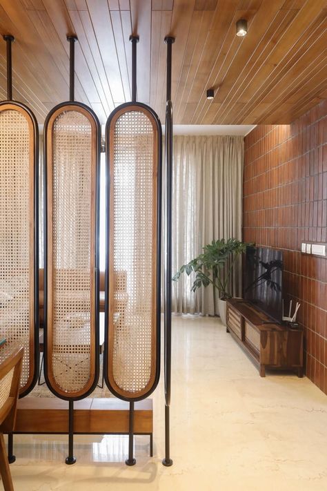 Cane Partition Interior Design, Cane Interior Design, Rattan Partition Design, Foyer Partition Ideas, Cane Partition, Foyer Partition, Rattan Partition, Partition Design Living Rooms, Wooden Partition Design