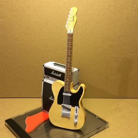 PAPERMAU: The Weekend Pic - Fender Telecaster Paper Model - by Papyrus Semper & Paper Guitar Origami Nativity, Paper Guitar, Cardboard Guitar, Papercraft Download, Matchbox Crafts, Free Paper Models, Miniature Guitars, Art Aesthetics, Miniature Photography