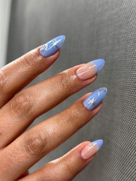 Medium almond gelx with shimmery blue french tip. French Tip Moon Nails, Moon Nails French Tip, Light Blue And Silver Nails Almond, Moon Nails Blue, French Tip With Stars, Nails Blue French Tip, Almond Blue Nails, Columbia Dorm, Blue Moon And Stars Nail Art