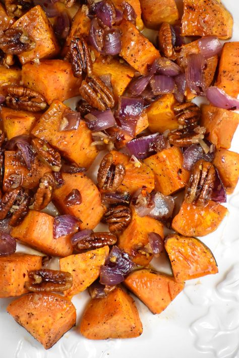 Give your roasted sweet potatoes a spicy-sweet makeover. These bite sized nuggets are glazed with a beautiful Chili Maple glaze and enhanced by tasty, crunchy pecans. Summer Sweet Potato Recipes, Diced Sweet Potato Recipes, Roasted Sweet Potato Recipes, Sweet Potatoes With Pecans, Sliced Sweet Potatoes, Spiced Sweet Potatoes, Honey Roasted Sweet Potatoes, Maple Glazed Sweet Potatoes, Thanksgiving Dinner Plates