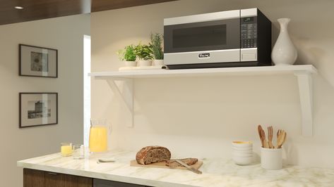 13 Places to Put a Microwave in Your Kitchen - House Tipster Microwave On Floating Shelf In Kitchen, Small Kitchen Ideas Microwave, Microwave On Wall Shelf, Wall Mounted Microwave Ideas, Where To Put The Microwave In A Kitchen, Microwave On Floating Shelf, Microwave On Shelf In Kitchen, Microwave Storage Ideas Small Kitchen, Microwave Shelf Ideas Diy