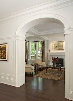 Love it!  Arched doorway and high chair rail. Gorgeous! #eclecticstylebedroom Entrance Halls, Hallway Entrance, Arch Doorway, Planning Board, Plafond Design, Gorgeous Houses, Foyer Decorating, Entry Hallway, Storey Homes