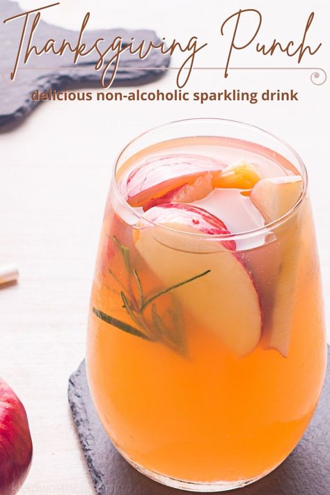 Cozy up with a glass of this Thanksgiving Punch! It's a fruity holiday drink that is perfect for holiday gatherings with friends and family. Thanksgiving Drinks Non Alcoholic For A Crowd, Nonalcoholic Thanksgiving Punch, Thanksgiving Punch With Sherbert, Kid Friendly Thanksgiving Drinks, Thanksgiving Punch Non Alcoholic Apple Cider, Thanksgiving Drink Station Ideas, Holiday Punch Non Alcoholic Thanksgiving, Thanksgiving Virgin Drinks, Thanksgiving Kid Drinks